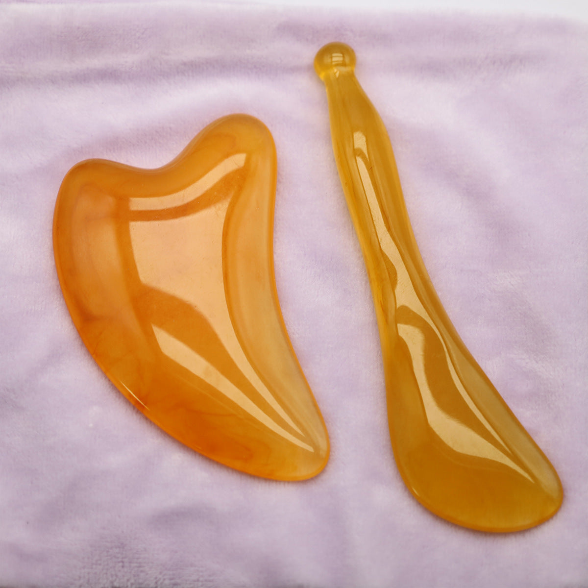 Ikki qismli to'plam, yuz va ko'zlar uchun asal mumidan yasalgan qirqish taxtalari, akupunktur nuqtalari massaji uchun burun qirqgichi.