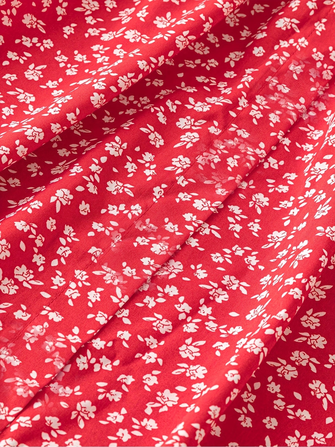 Falda de talla grande con estampado floral y detalles de botones, cintura elástica