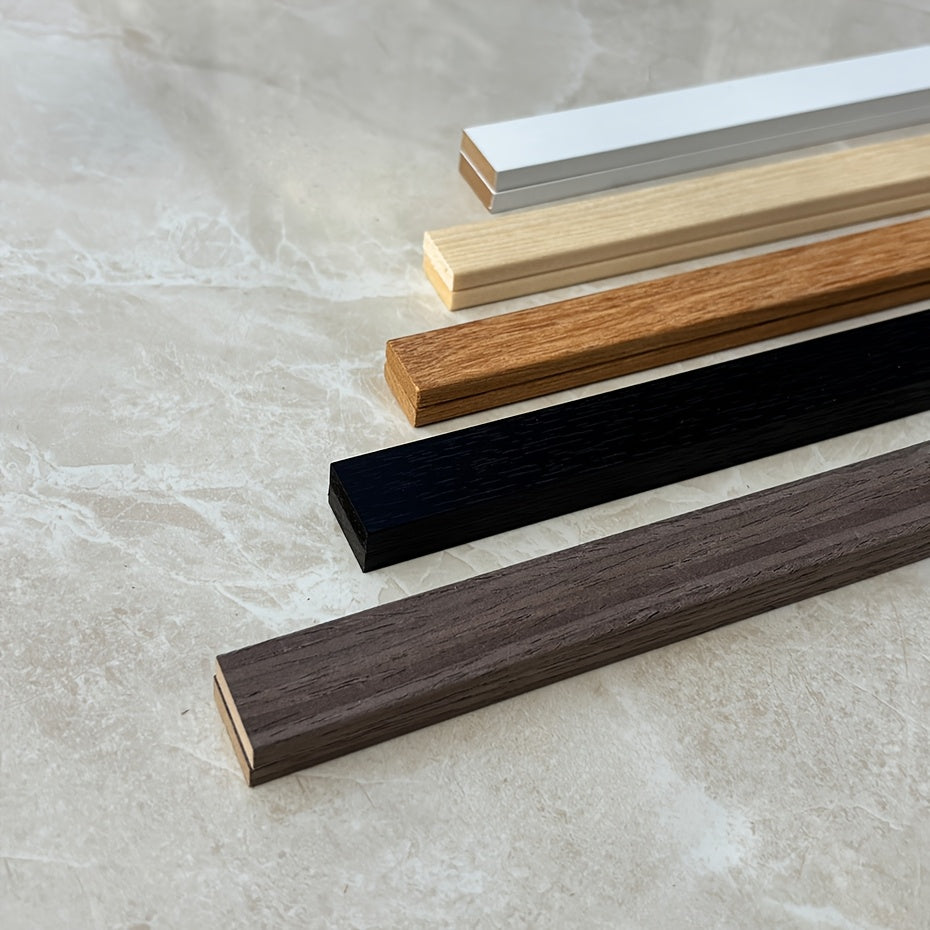 Zamonaviy magnitli yog'och ramkalar, turli o'lchamlarda, kuchli magnitlar bilan, har xil yuzalarda xavfsiz osish uchun mo'ljallangan, har qanday xonada fotosuratlar va kanvas san'at uchun ideal.