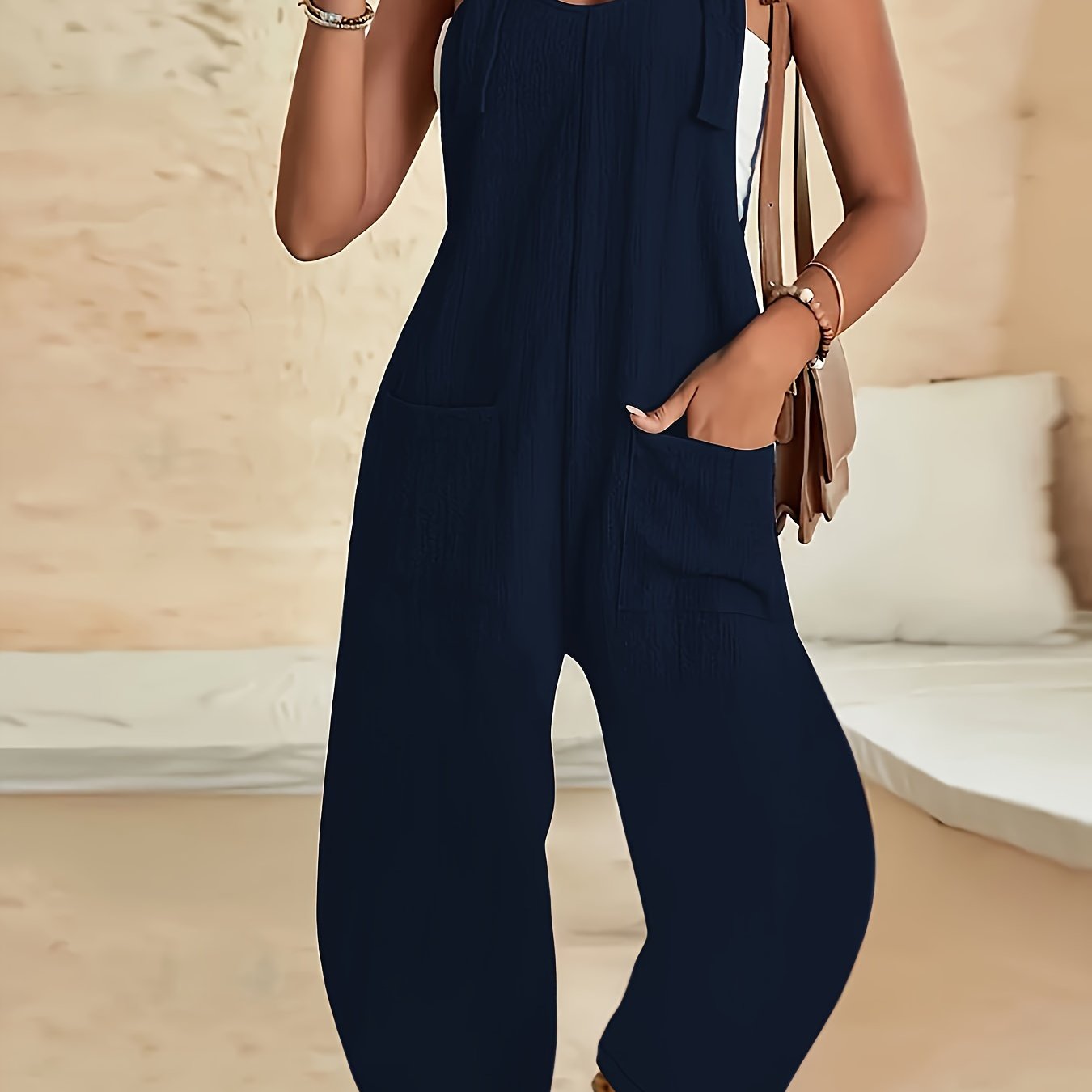 Mono de mujer con textura y nudo con bolsillos, sin mangas, casual, poliéster