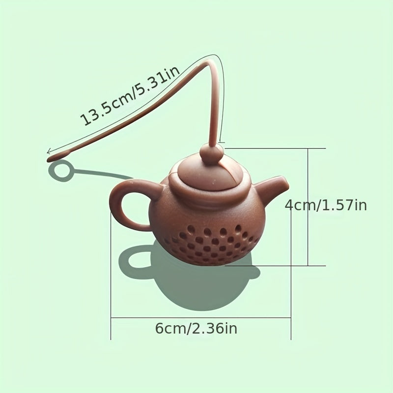 Креативный силиконовый заварник в форме чайника с ручкой, идеально подходит для заваривания листового чая или ароматизации чая специями. Универсальный кухонный гаджет для любителей чая.