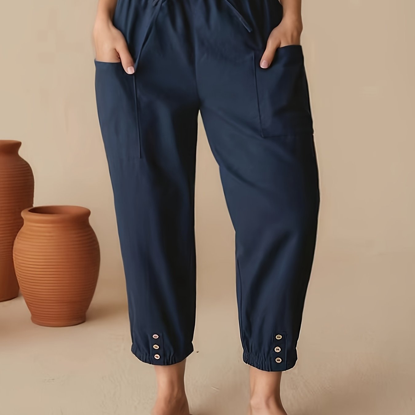 Pantalones casual de cintura alta y corte cropped para mujer con bolsillos azul marino