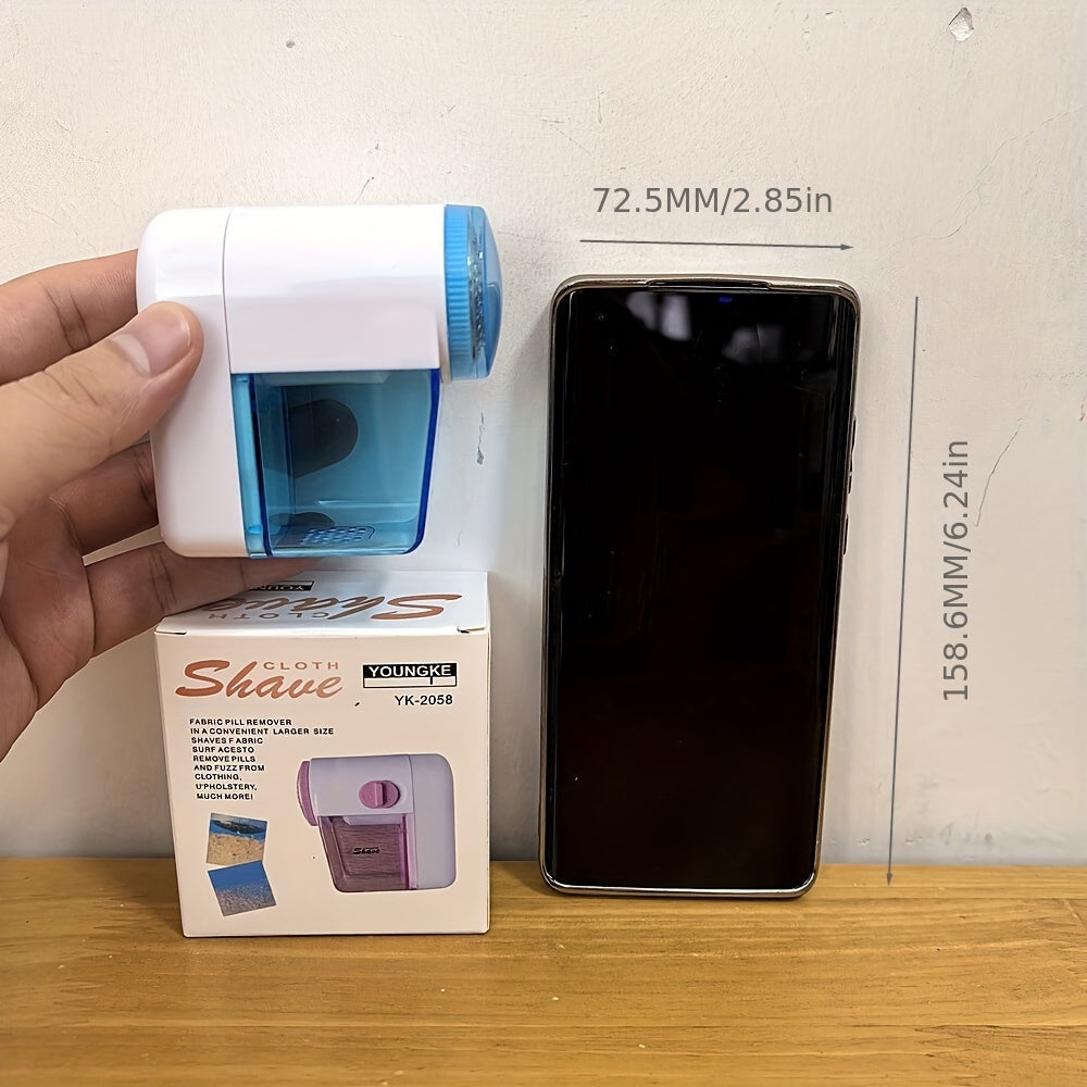 Kiyimlar va mebellar uchun portativ, batareyali mato tolalarini tozalash vositasi