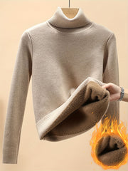 Ayollar uchun yuqori bo'yli qalin flis sviter, qish uchun mukammal. Poliamid, viskoza va polyester aralashmasidan tayyorlangan. Mustahkam rang dizayni, 529g/m² mato og'irligi. Kuz/qish uchun zaruriy buyum.