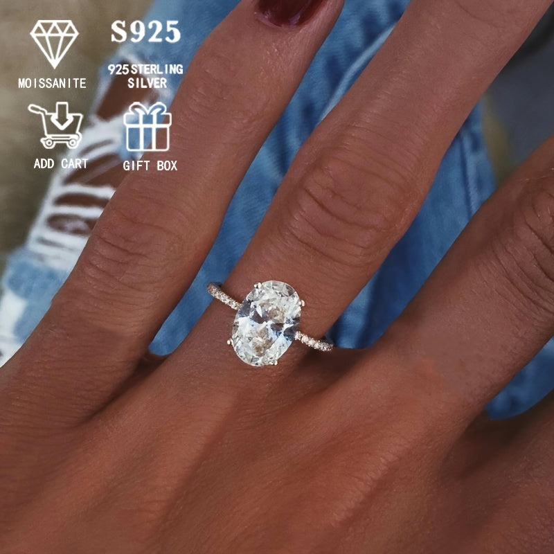 Серебряное обручальное кольцо с овальным моиссанитом, выполненное в элегантной 4-лапковой паве. Вечный модный аксессуар для женщин, идеальный для предложений, юбилеев, дней рождения и Дня матери. Поставляется в красивой подарочной коробке.