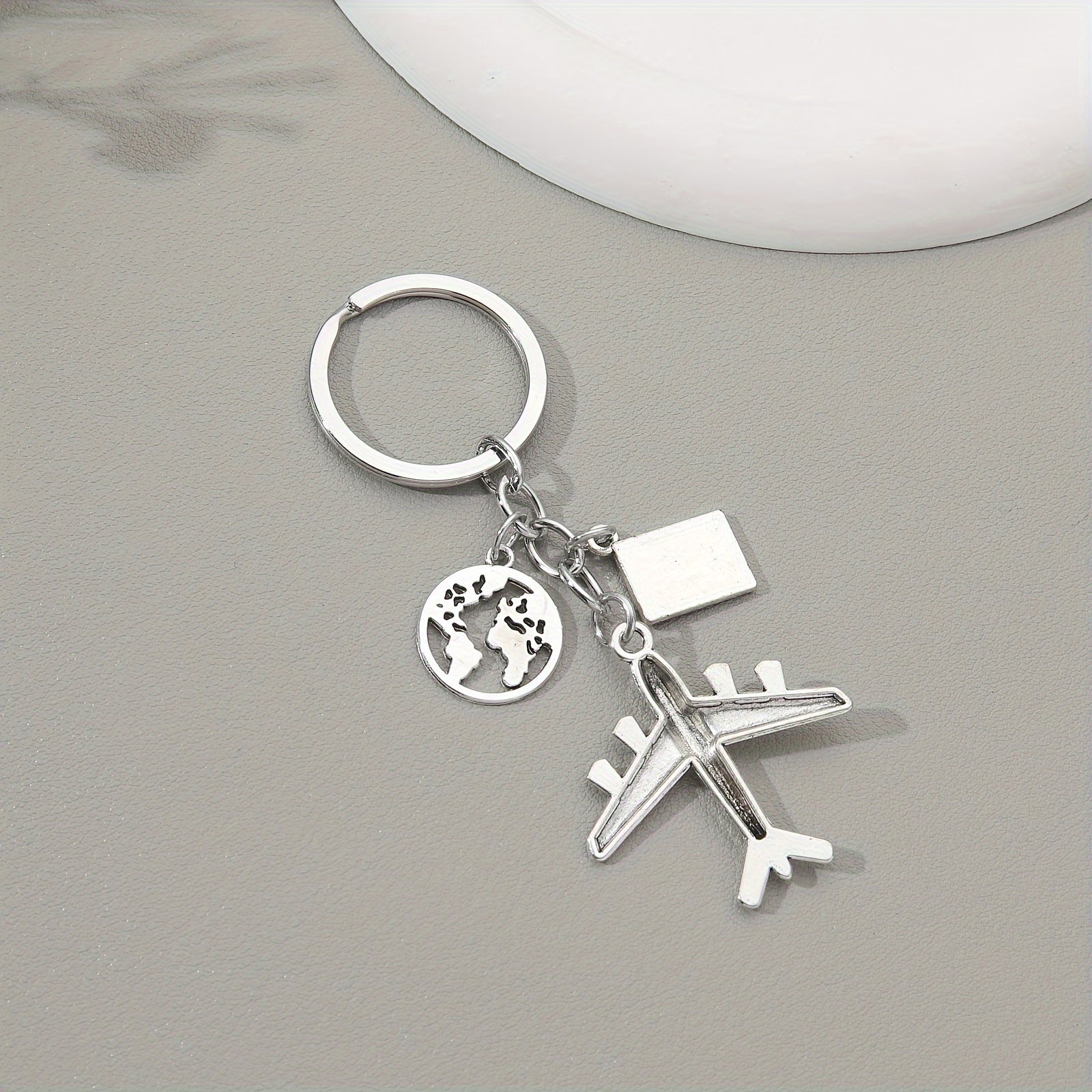 Juego de 20 llaveros de avión con temática de la Tierra con diseño de piloto y colgante de viaje y llavero de viajero