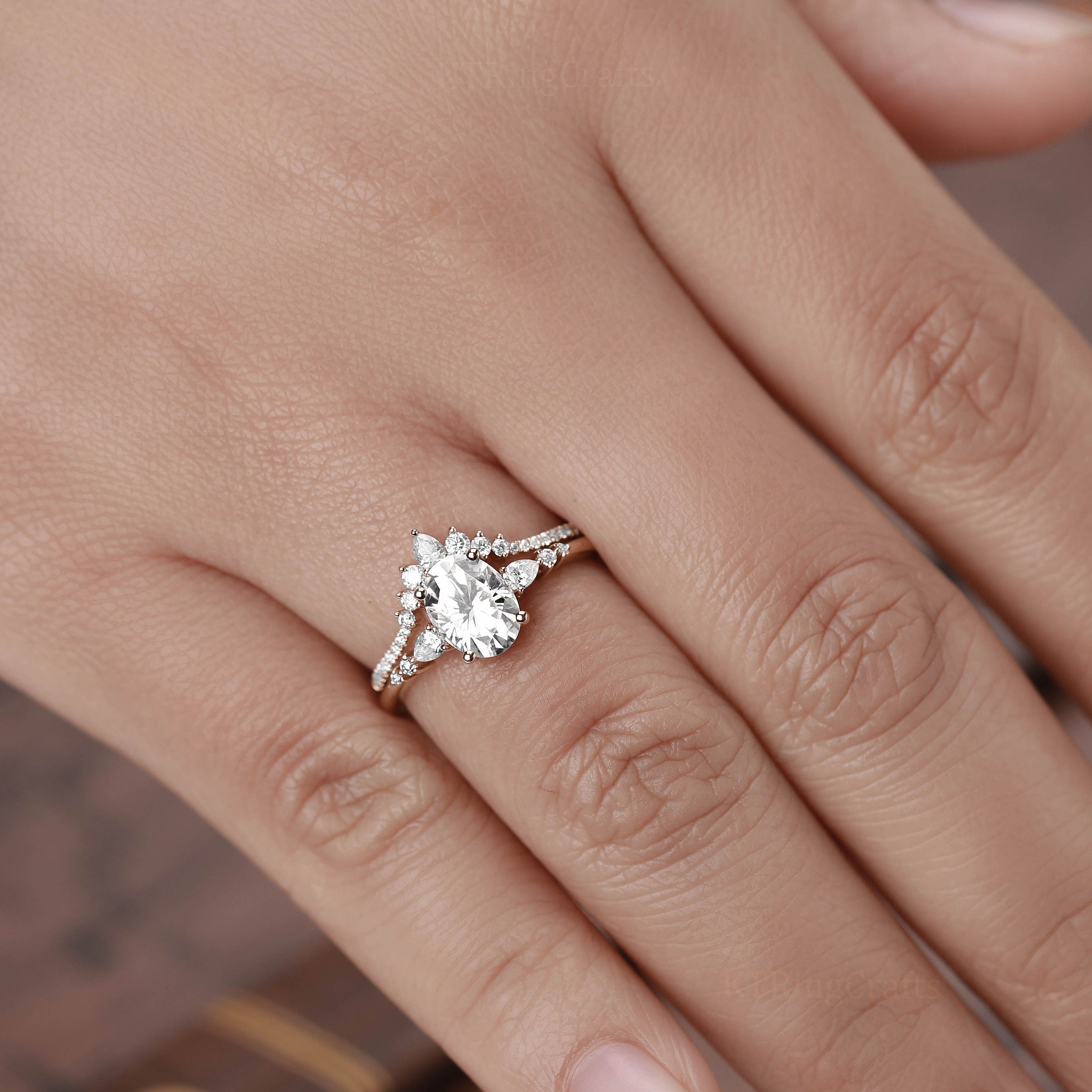 Elegant Egg-Shaped Engagement Rings for Women with Oval Cubic Zirconia Center and Teardrop Accents