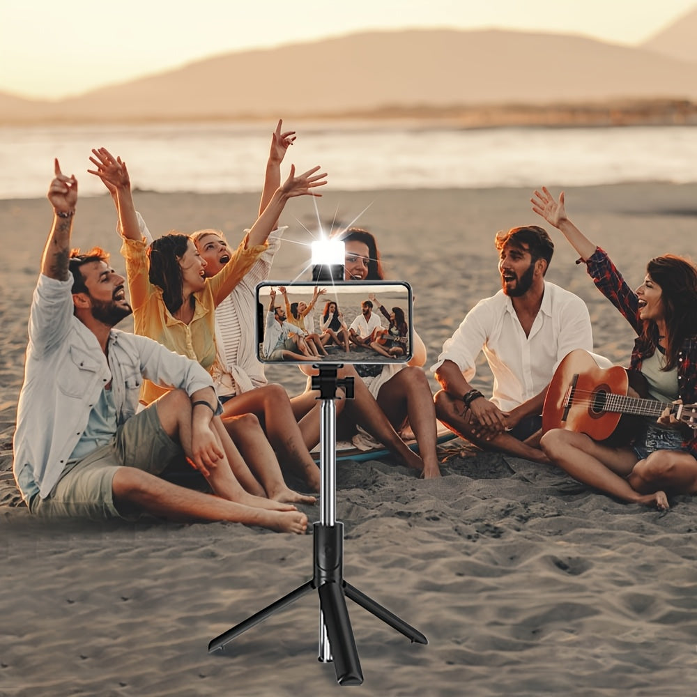 Расширяемая мобильная селфи-палка-трипод с беспроводным пультом и 360° вращением. Совместима с различными смартфонами. Идеально подходит в качестве подарка.