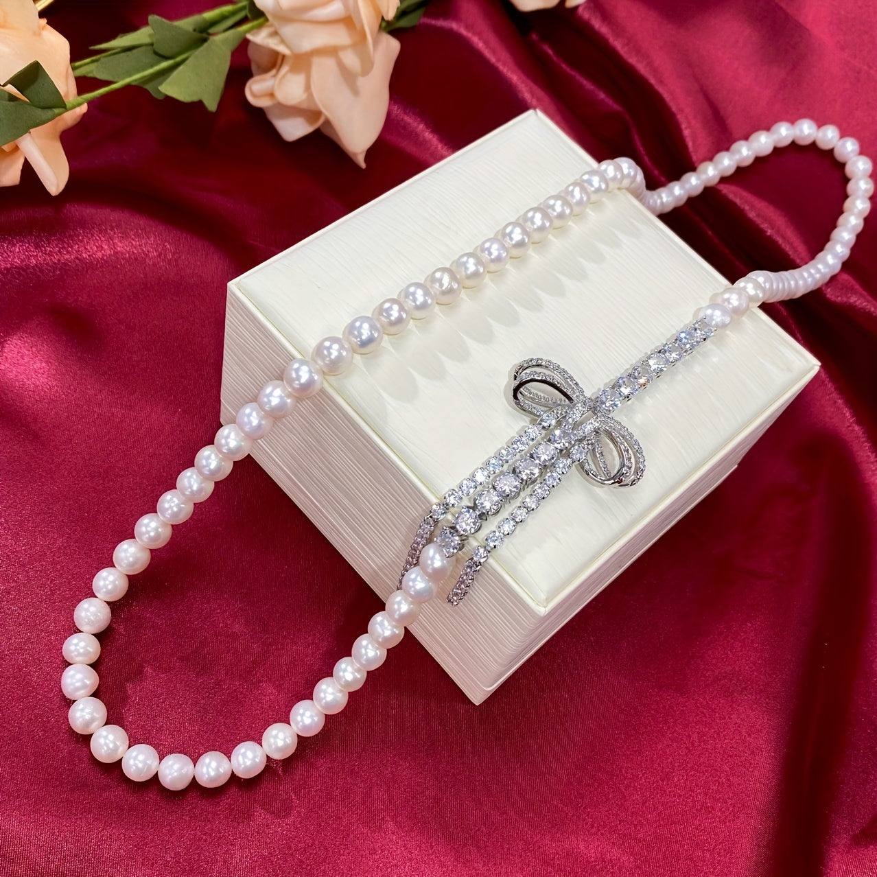 Pearl Necklace with Cubic Zirconia Bow for Weddings and Special Events