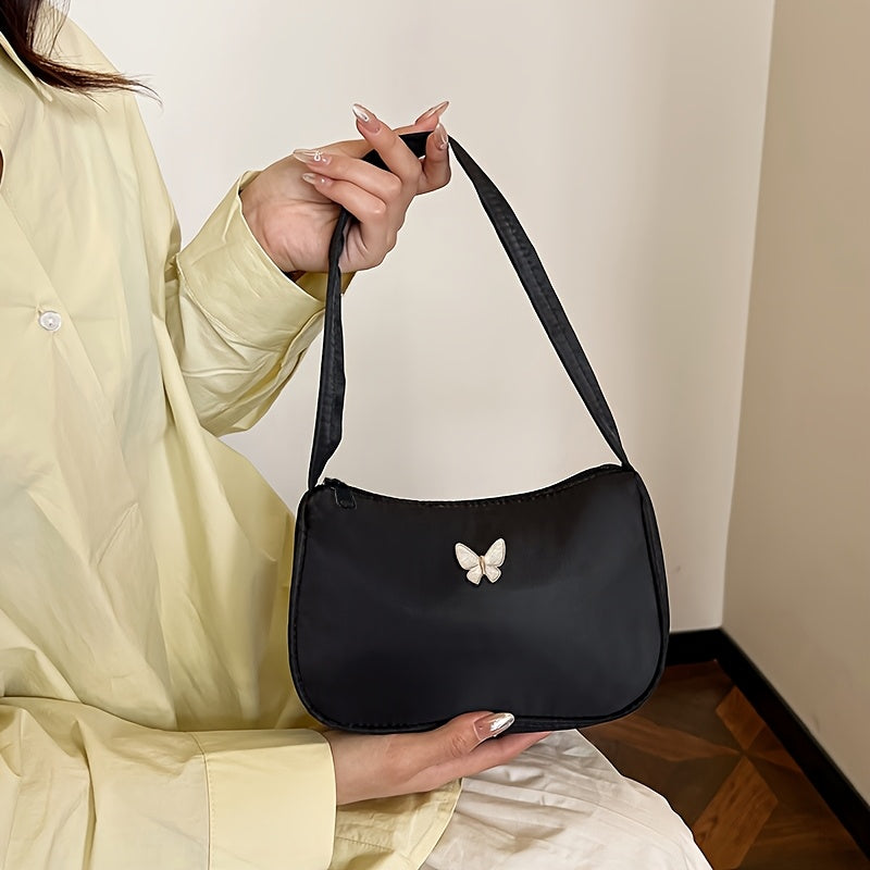 Ayollar uchun qora naylon crossbody sumka, tassel aksenti va zip yopilishi bilan