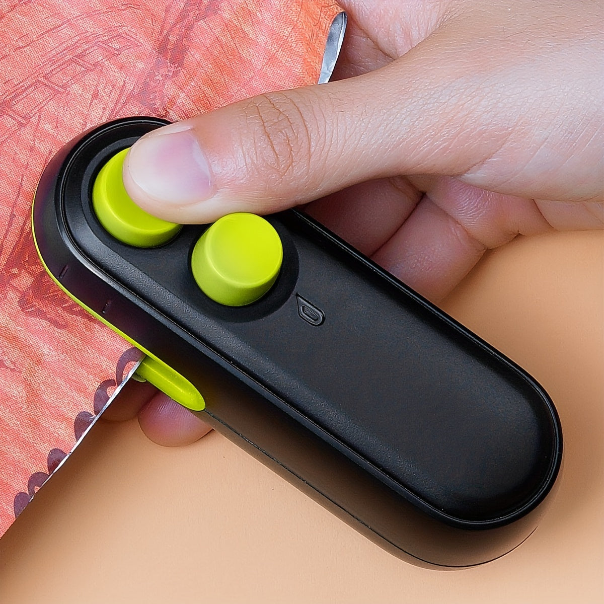 Máquina compacta y recargable para sellar bolsas de plástico con función de apertura de bolsa