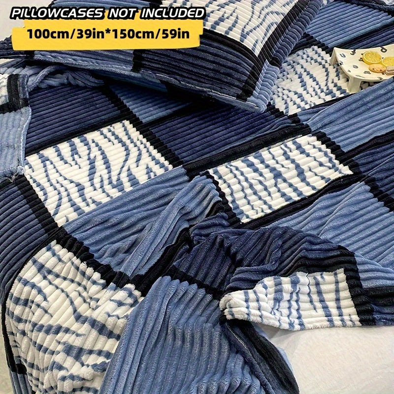 Yumshoq va qulay plush ko'rpa, plaid naqshiga ega, sayohat, divan, yotoq va uy bezatish uchun mukammal.