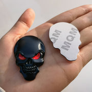 Emblema de coche calavera gótica de metal negro con ojos rojos, calcomanía duradera