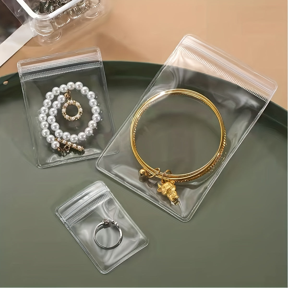 Yuzta o'z-o'zini yopadigan zargarlik buyumlarini saqlash sumkasi to'plami, uzuklar va sirg'alar uchun