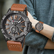 Reloj de cuarzo vintage para hombre con correa de cuero sintético y esfera a rayas