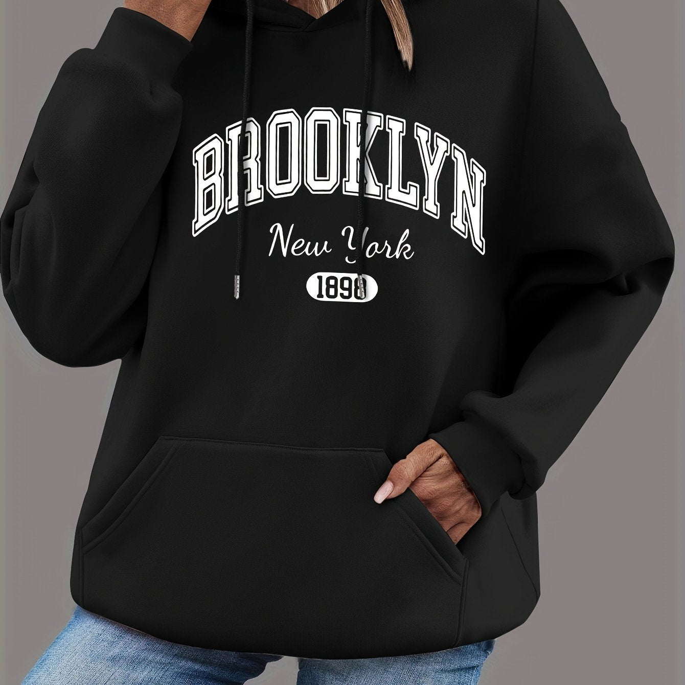 Sudadera con capucha de talla grande para mujer negra con bolsillos y estampado gráfico