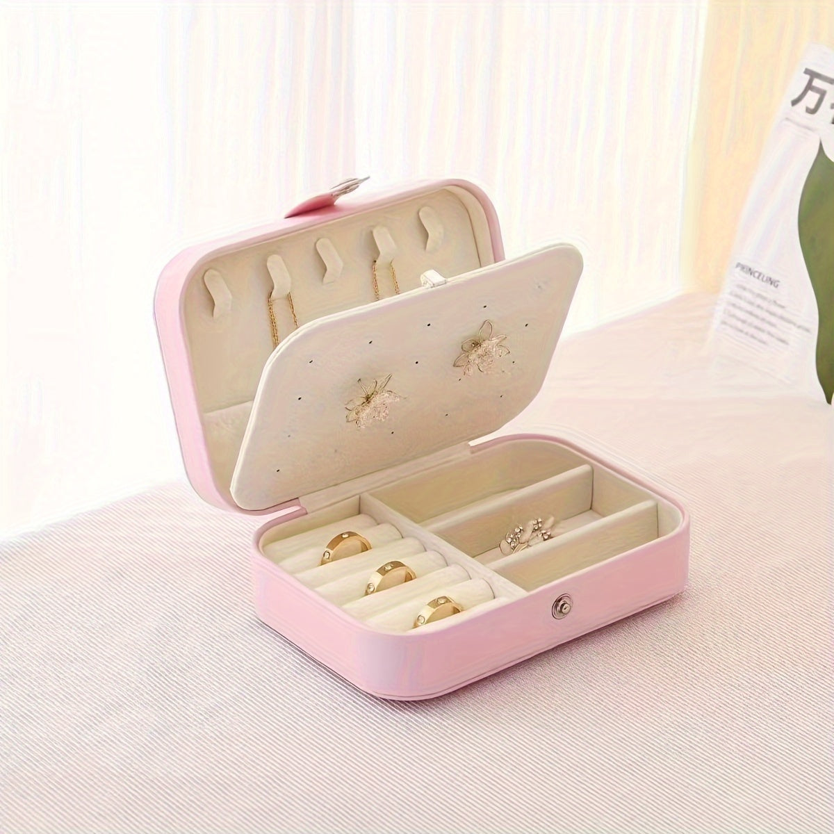 Joyero rosa para mujeres con compartimentos y espejo