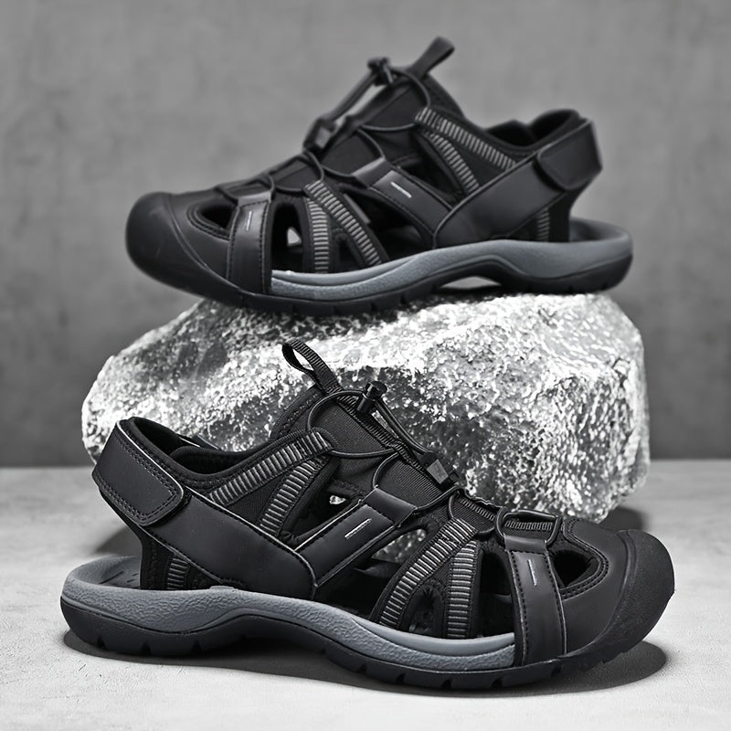 Barmoqni yopadigan erkaklar sandallari, tasmali, nafas oladigan, sirpanmaydigan kauchuk taglik, yozda plyaj va suv faoliyatlari uchun chidamli.