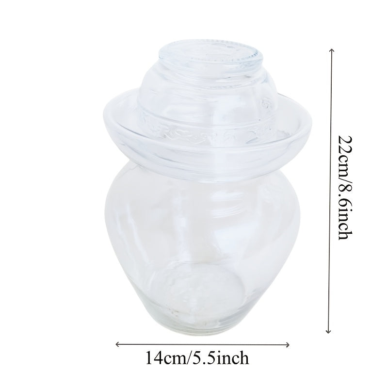 Банка для ферментации огурцов с крышкой с водяным уплотнением.