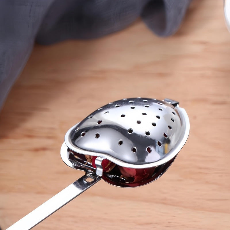 Infusor de té de acero inoxidable en forma de corazón con mango largo para té de hojas sueltas
