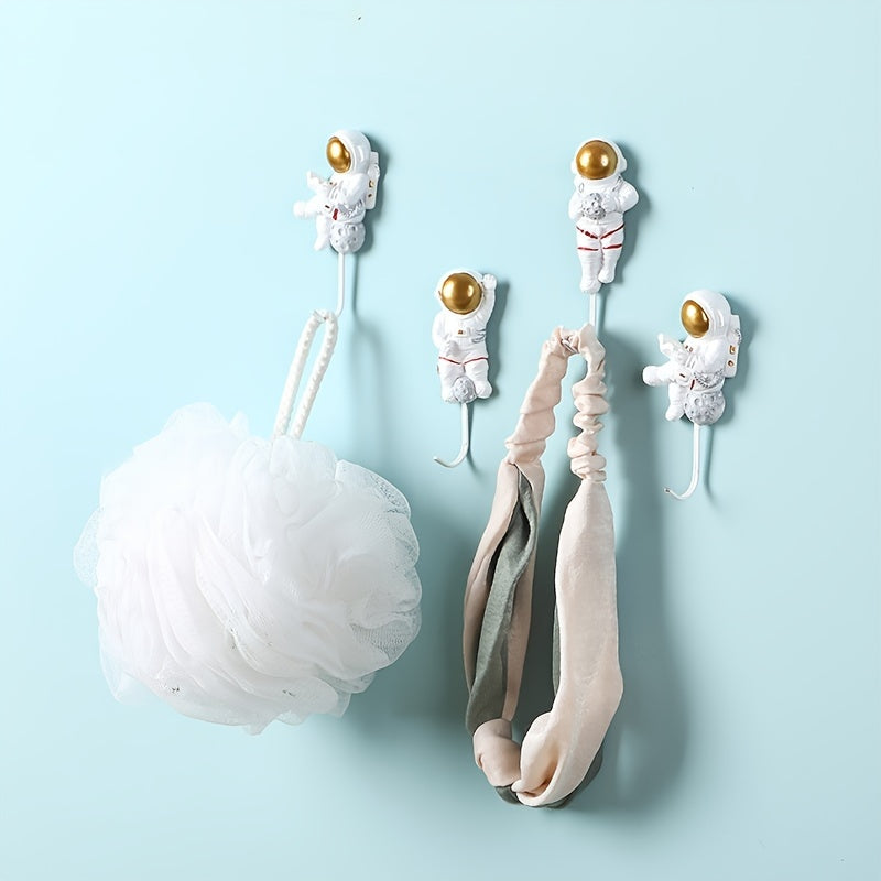 Ganchos de pared para cocina y puerta con diseño de astronauta adhesivo, fuerte y sin daños