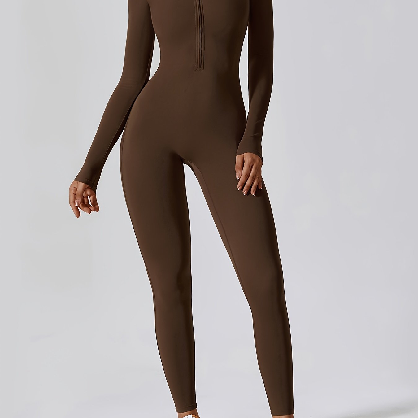 Women's Long-Sleeved Solid Color Yoga Jumpsuit with Zipper and High Stretch Nylon Fabric