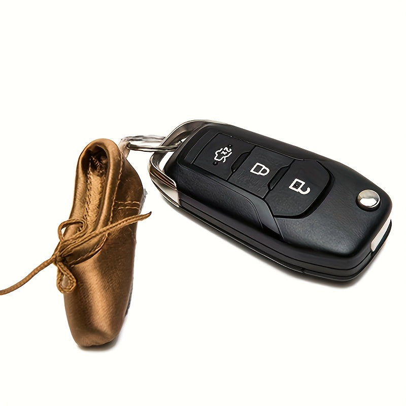 Kichik balet poyabzalari kalit zanjiri, sevimli pointe poyabzallari bilan, kalitlarga, sumkaga, ruksakga yoki hatto quloqchin qutisiga ilish uchun mukammal. Ayollar yoki qizlar uchun ajoyib sovg'a.