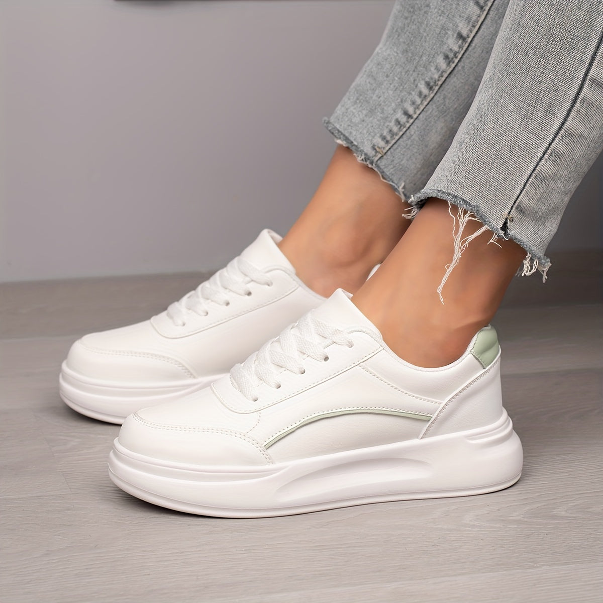 Women's White Low Top Skate Shoes with Round Toe and Lace-Up Closure