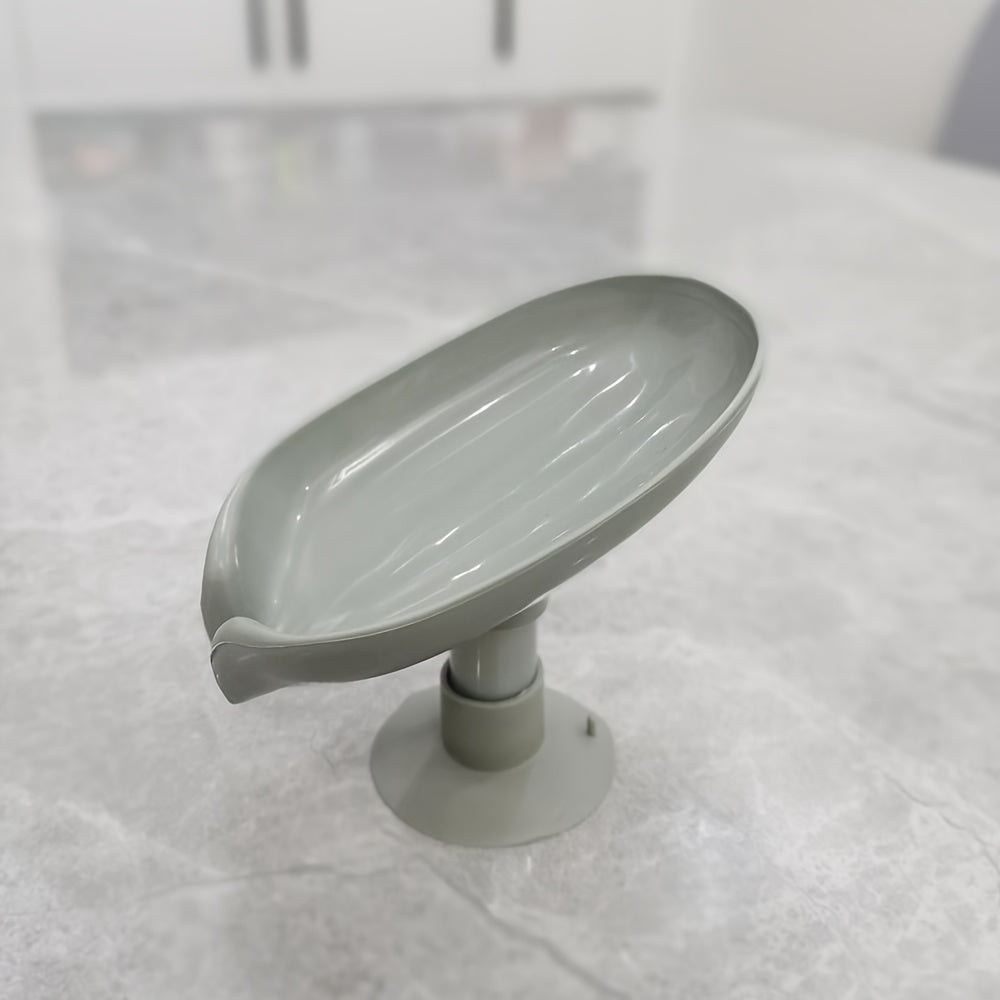 Uyda foydalanish uchun so'kma qopqog'i dizayni bilan plastik oval sabun idishi.