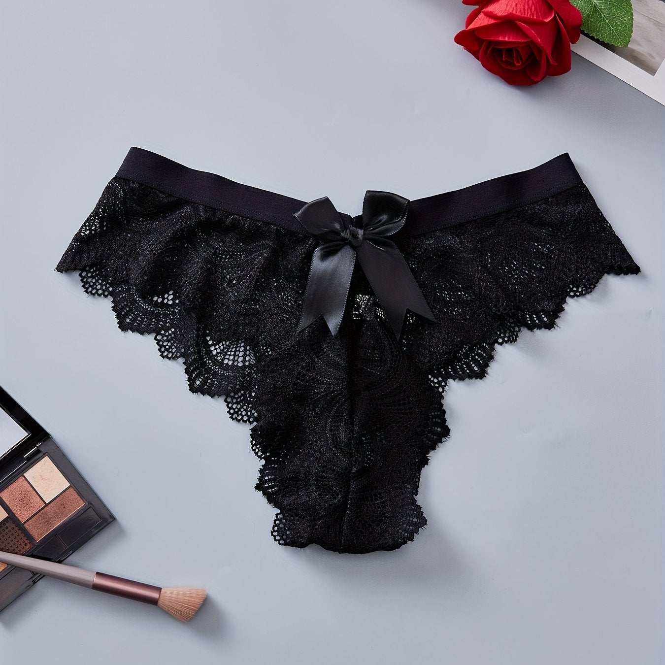 Ayollar uchun nafas oladigan nylon aralashmasidan tayyorlangan, yarim shaffof dizaynga ega bo'lgan dantelli kamzul bow-tie ichki kiyimlar qulay moslikni ta'minlaydi.