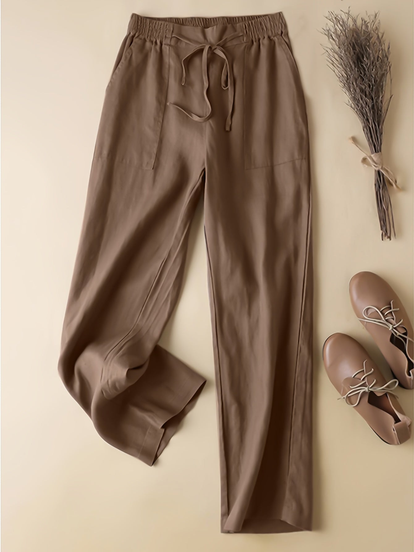 Pantalones de mujer de talla grande con bolsillos inclinados y cintura elástica para primavera y otoño