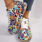 Zapatillas altas para mujer con suela acolchada de material sintético y graffiti vibrante