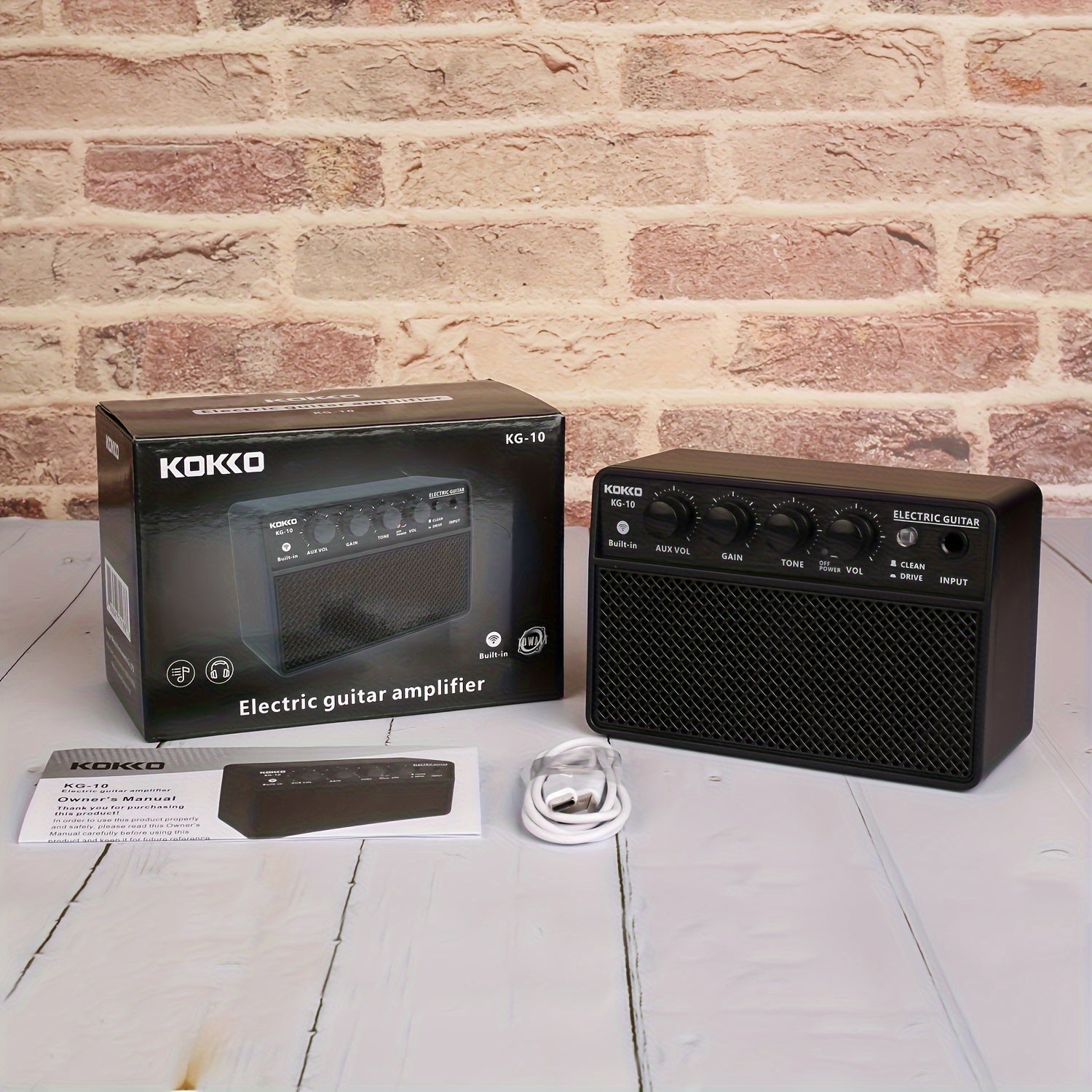 Portable Electric Guitar Amplifier Black Plastic Rechargeable Battery Built-in Effects Aux Input