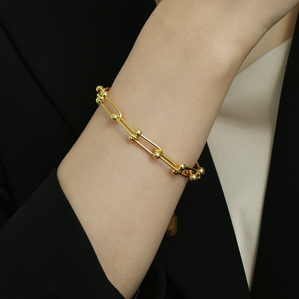 2 ta U-shakli teshik bilaguzuk va marjon to'plami, zanglamaydigan po'latdan tayyorlangan, zanglamaydigan ot teshik dizayni bilan. Erkaklar, ayollar va o'smirlar uchun har kuni kiyish uchun mukammal. Shuningdek, ajoyib bayram sovg'asi bo'lib xizmat qiladi.