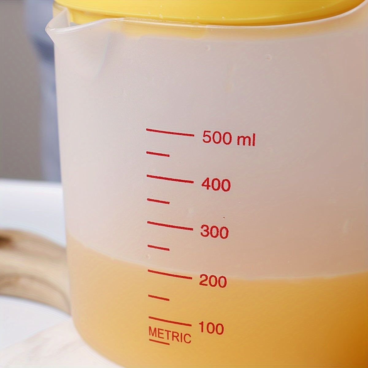 Exprimidor de cítricos manual con medidor incorporado para limón y naranja