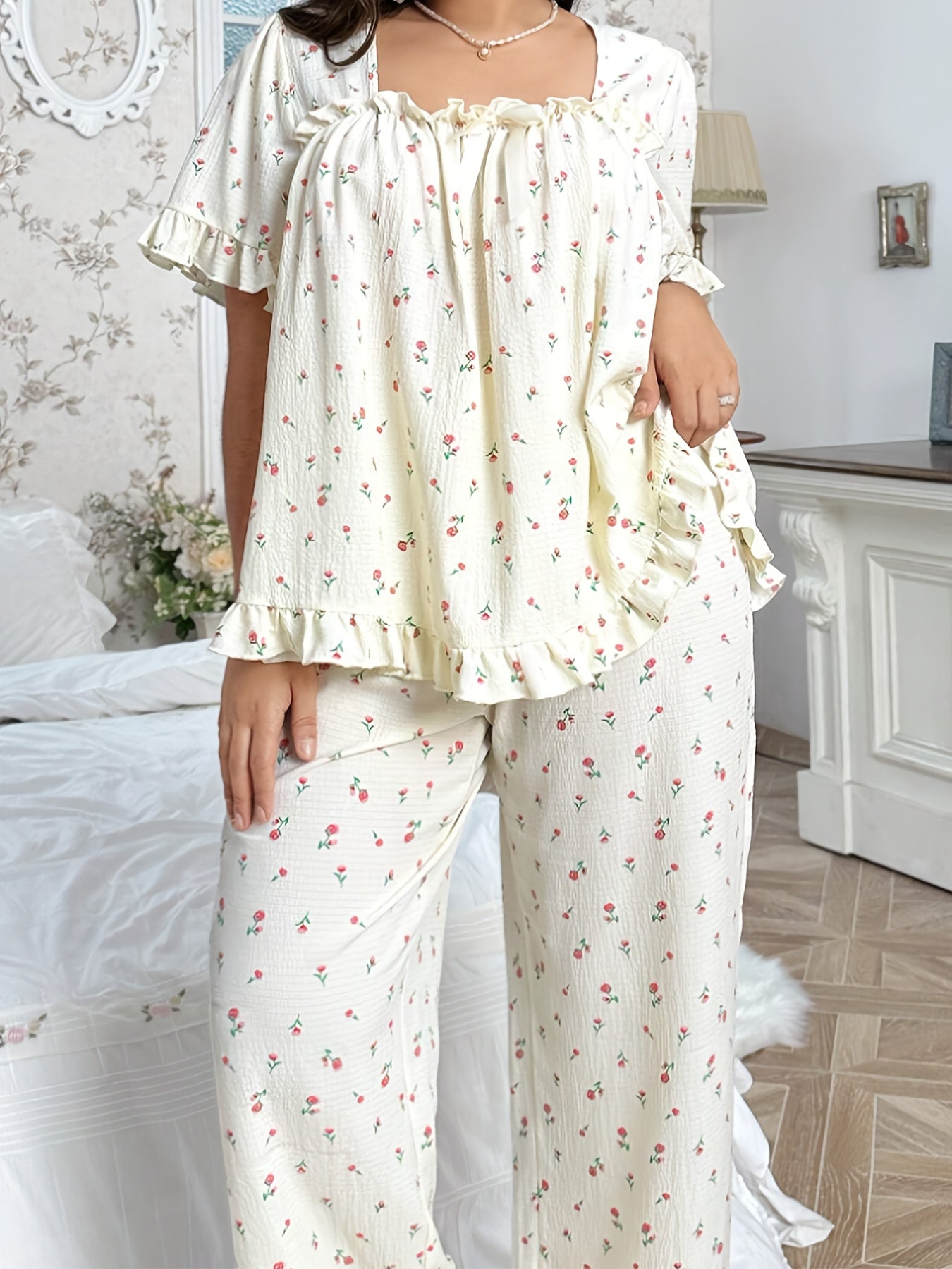 Conjunto de dos piezas con estampado floral para mujer con top de manga corta con dobladillo de volante y pantalones elásticos