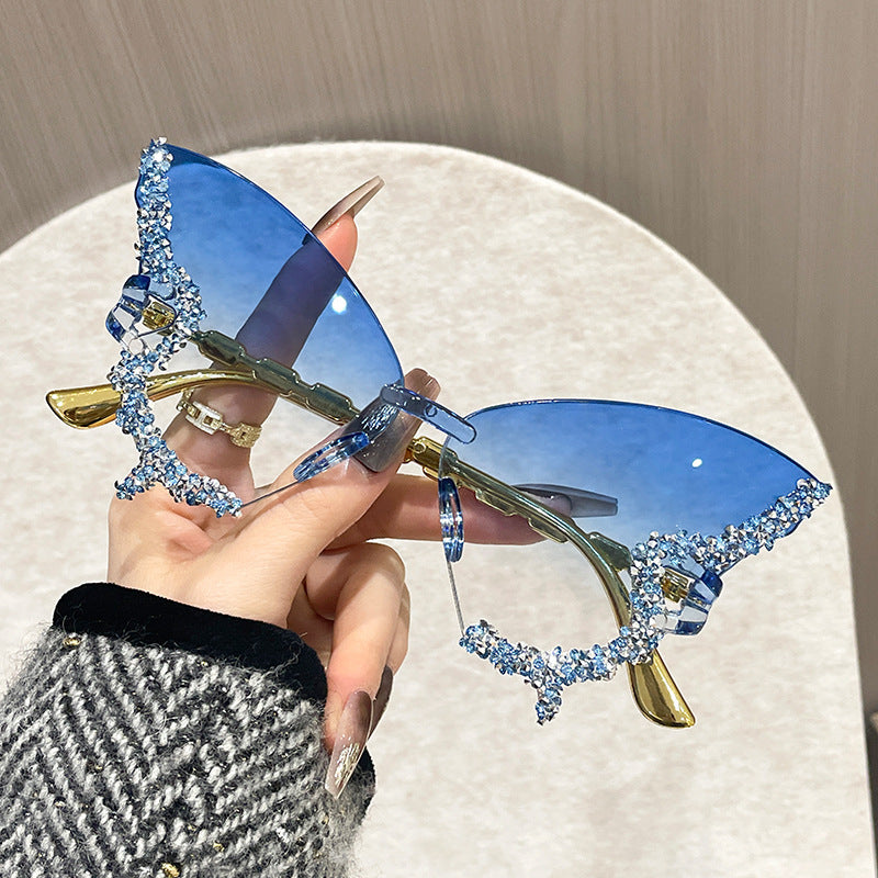 Women's Butterfly-Shaped Rimless Glasses with Rhinestone Accents and Polycarbonate Lenses