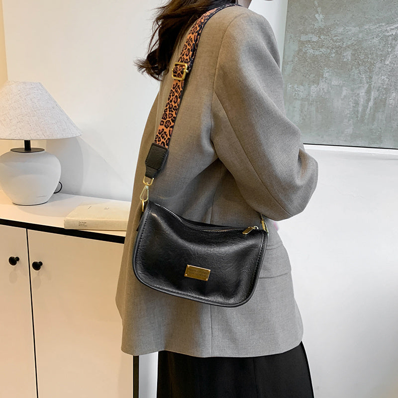 Women's Shoulder Bag with Adjustable Leopard Print Strap Zipper Closure Edge Paint Detail