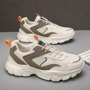 Erkaklar uchun prep stili sport krossovkalari, nafas oladigan to'r bilan, soxta pastki dizayn, bir rangda. Tasodifiy yugurish va mashg'ulotlar uchun ideal. Yuqori burchak, EVA taglik, mato ichki qismi va bog'ichli yopish bilan ajralib turadi.