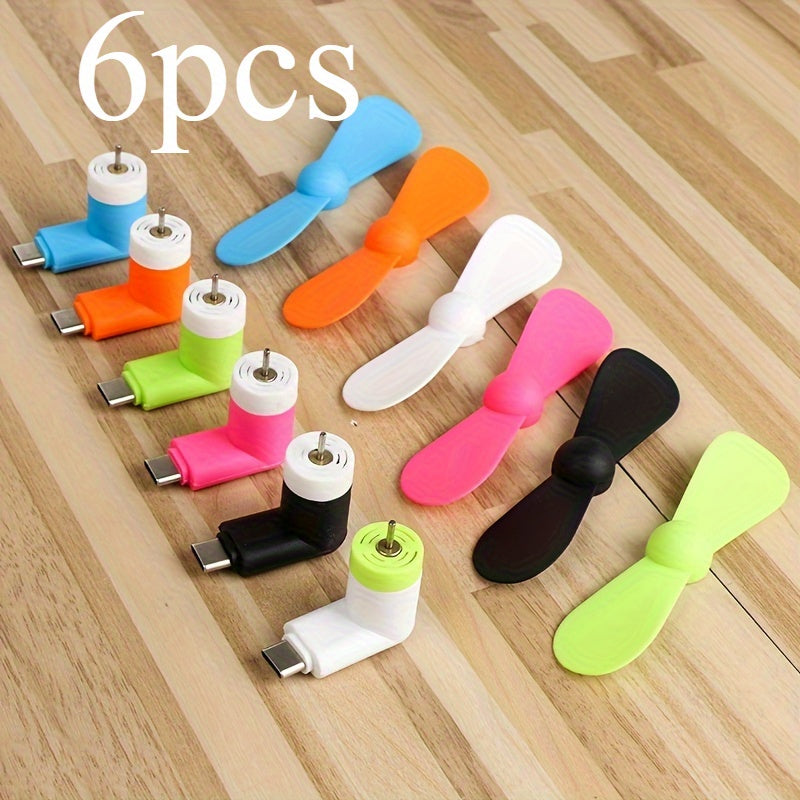 Android va Apple qurilmalari uchun uchta portativ mini telefon ventilyatori, USB quvvatlanadi va rang-barang. Yorqin ventilyator dizayni va sozlanadigan burchak bilan yozgi sovutish uchun ideal vosita. Telefon aksessuarlari.