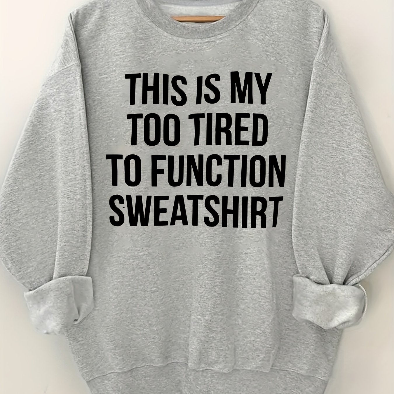 Толстовка бежевого цвета с круглым вырезом и черным принтом для женщин