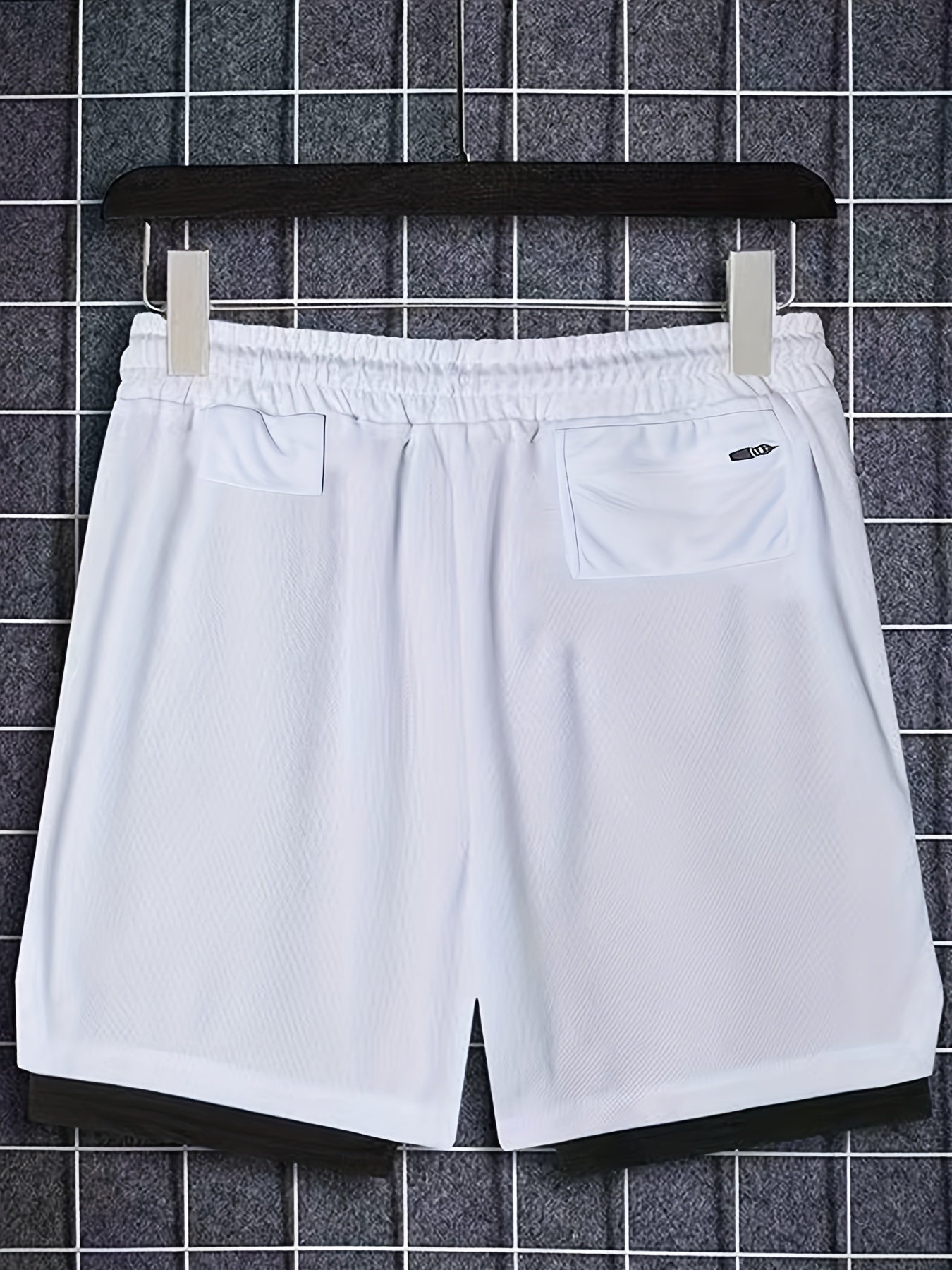 Conjunto deportivo de poliéster para hombre, camiseta sin mangas y pantalones cortos de baloncesto sueltos