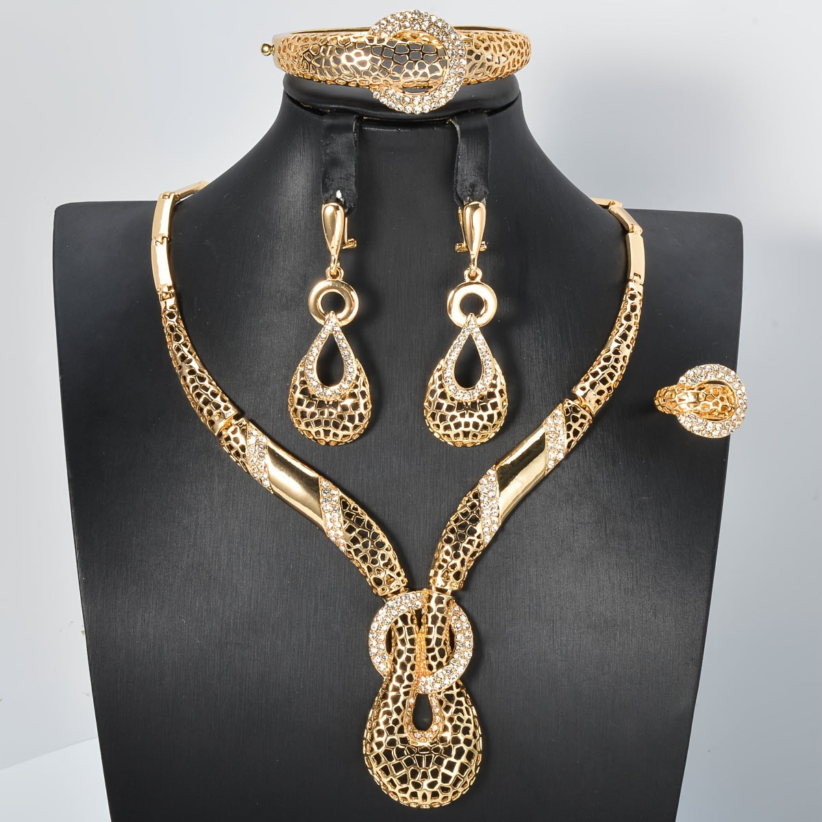 Gold Tone Geometric Jewelry Set with Necklace Bracelet Earrings and Ring for Weddings and Parties