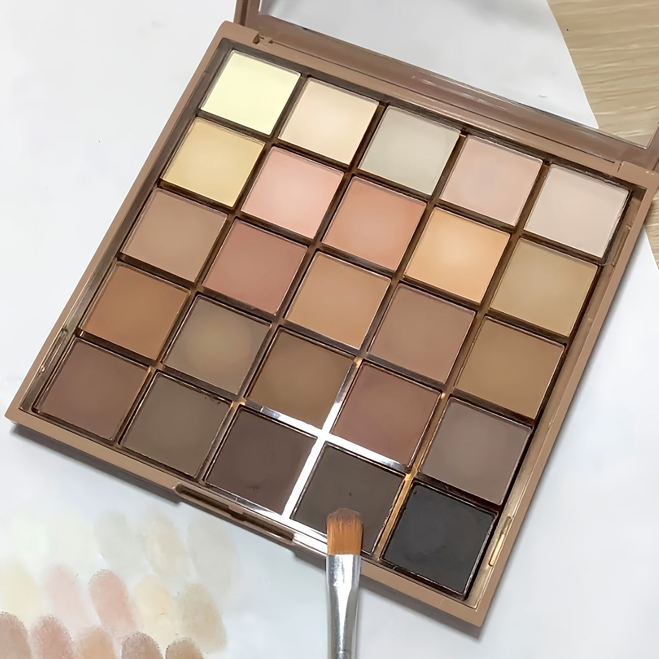 K'APEINE 25-Color Eyeshadow Palette: Matte & Shimmer finishes, Waterproof, Highly Pigmented in Orange-Brown Nude Shades.
