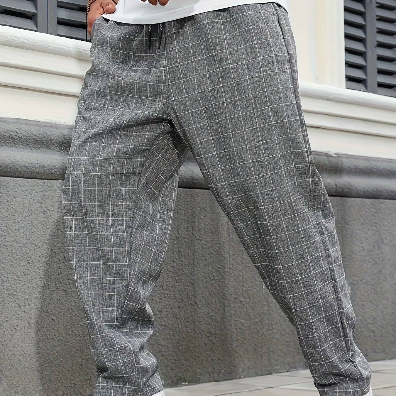 Pantalones jogger casual de cuadros de poliéster tejido de tamaño grande para hombre con cintura ajustable