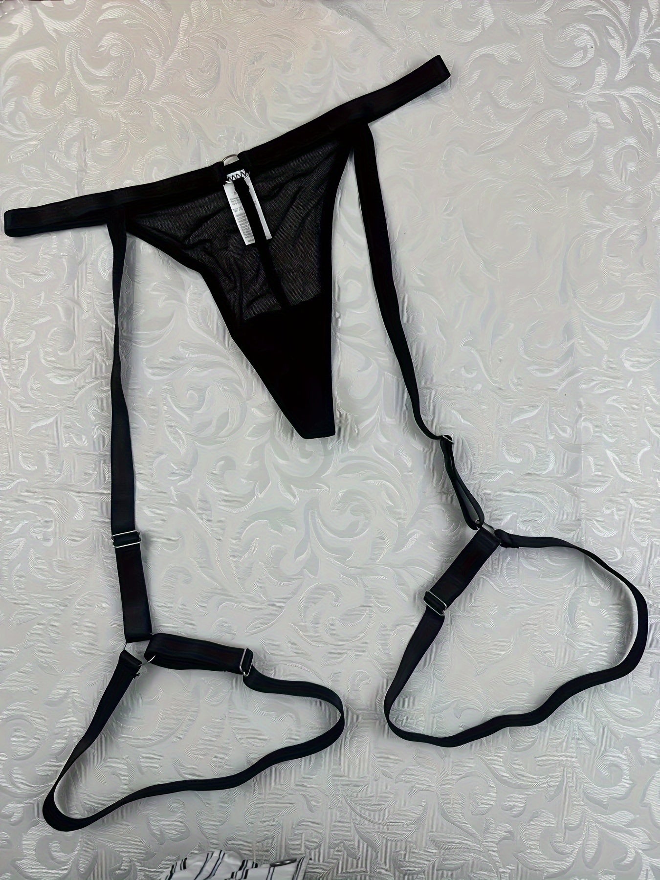 Conjunto de lencería de cinturilla con liguero y tanga de malla transparente para mujer