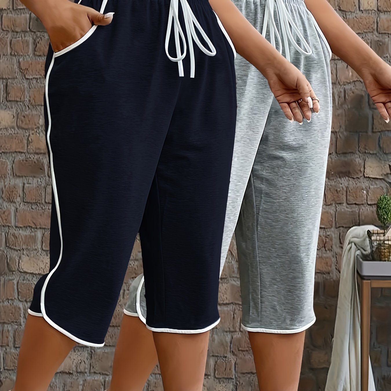 Conjunto de leggings de talla grande para mujer en bloques de color con bolsillos, 2 piezas