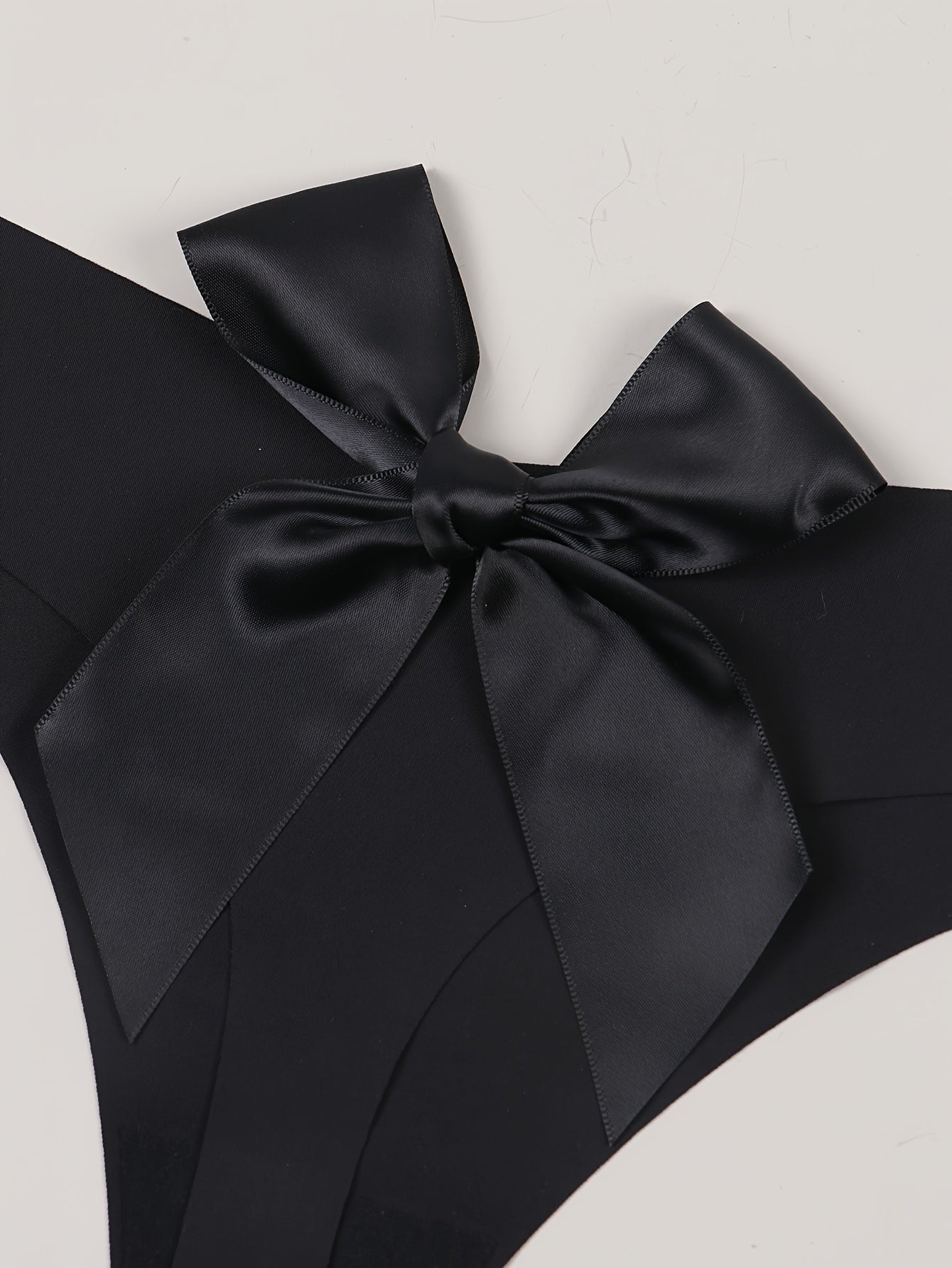 Женские трусики-стринги большого размера, тонкие и комфортные, черные с большим бантом