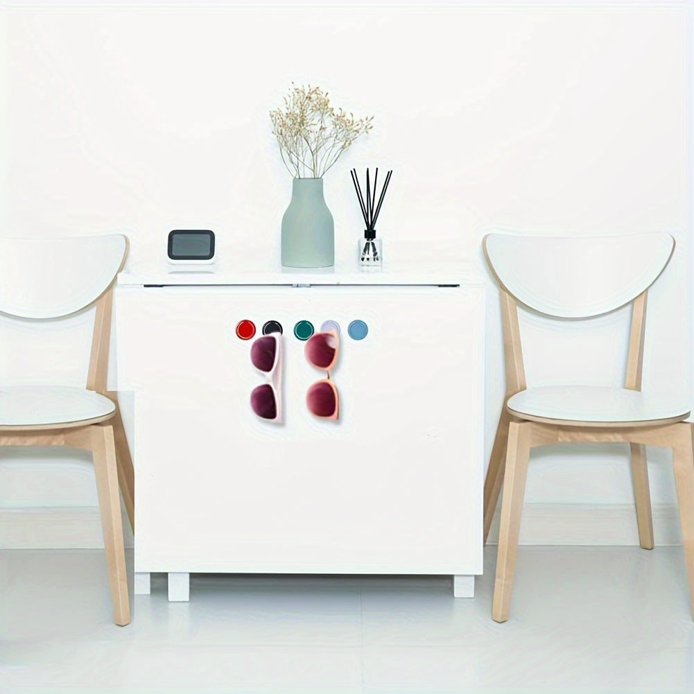 Devorga o'rnatiladigan ko'zoynak ushlagichi, 4 juft ko'zoynakni ko'rsatish, tartibga solish va osib qo'yish uchun.