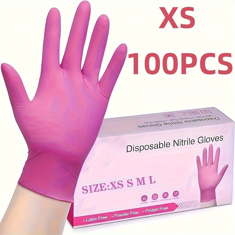 Одноразовые перчатки светло-розового цвета для уборки.